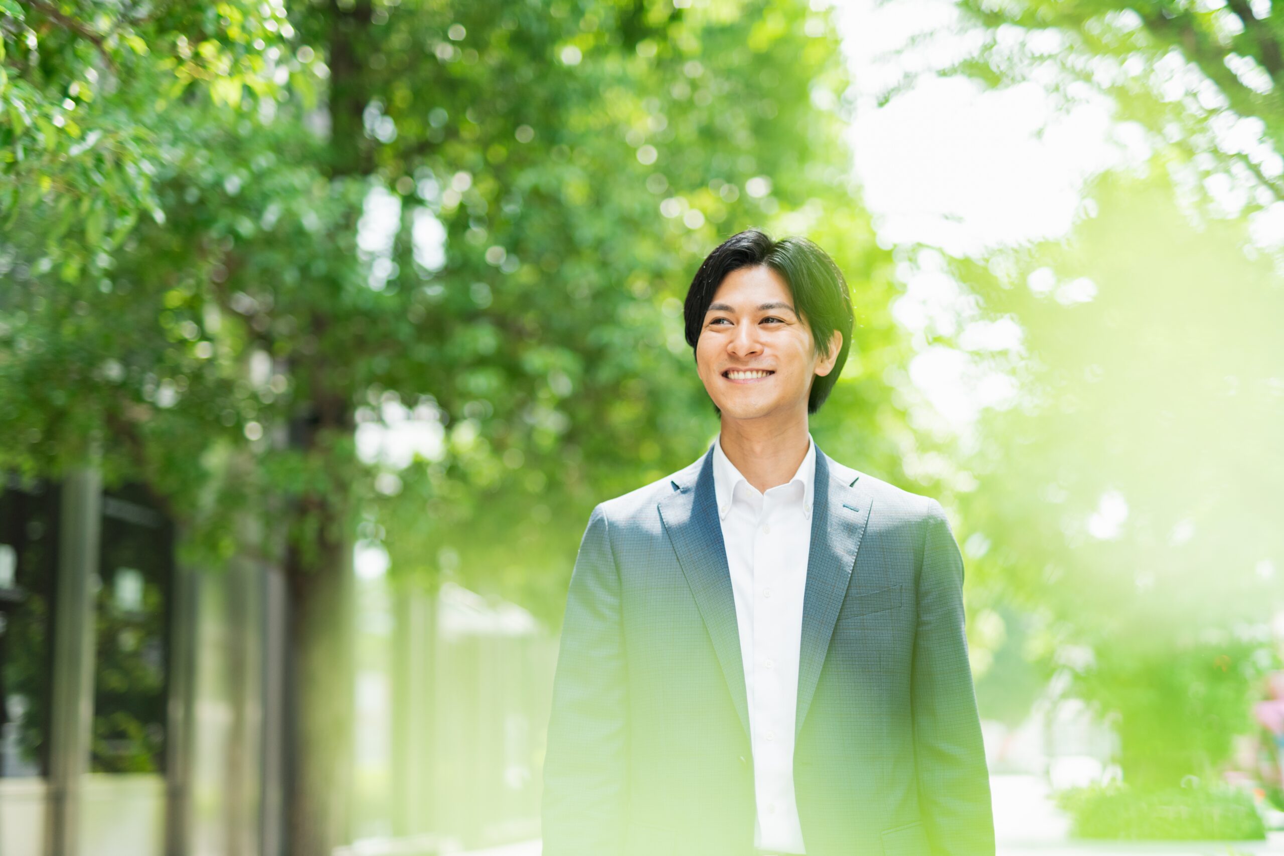 Young,Asian,Businessman,Working,In,The,Business,District